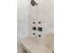 Shower with a built-in marble bench and black fixtures at 553 Old Compass Rd, Daniel Island, SC 29492