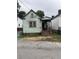 Exterior view of home showcasing the covered porch and peeling exterior paint at 6 Orrs Ct, Charleston, SC 29403