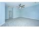 Bright bedroom with ceiling fan, carpet and an doorway leading into another room at 765 Certificate Ct, Charleston, SC 29414