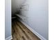 Walk-in closet features wood-look flooring and wire shelving units at 765 Certificate Ct, Charleston, SC 29414