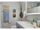 Stylish bathroom featuring modern fixtures, framed art, and elegant decor at 10 Teaneck Rd, Goose Creek, SC 29445