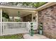Inviting front porch with white railing and beautifully potted plants at 10 Teaneck Rd, Goose Creek, SC 29445