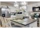 Modern kitchen with stainless steel appliances, white cabinets, granite countertops, and stylish island at 10 Teaneck Rd, Goose Creek, SC 29445