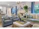 Inviting living room with modern lighting, stylish decor, and comfortable seating at 10 Teaneck Rd, Goose Creek, SC 29445