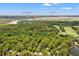 Aerial view of 1025 Scaup Ct nestled within lush green trees, near Kiawah Island Parkway at 1025 Scaup Ct, Kiawah Island, SC 29455