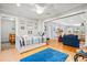 Bright bedroom features wood floors and is adjacent to the living area at 1025 Scaup Ct, Kiawah Island, SC 29455