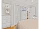 Well-lit bedroom with plenty of storage, mirror and ceiling fan at 1025 Scaup Ct, Kiawah Island, SC 29455