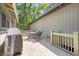 Spacious wooden deck with outdoor dining set and grill, perfect for outdoor entertaining at 1025 Scaup Ct, Kiawah Island, SC 29455