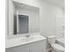 Bright bathroom featuring a white vanity, a large mirror, and a toilet at 108 Lefton Lndg, Summerville, SC 29485
