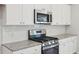 Modern kitchen with granite countertops, stainless steel appliances, and subway tile backsplash at 108 Lefton Lndg, Summerville, SC 29485
