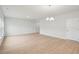 A spacious living room with hardwood floors, ample natural light, and modern fixtures at 108 Lefton Lndg, Summerville, SC 29485
