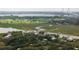 Scenic aerial view of Charleston with the Ravenel Bridge and waterfront homes surrounded by marshland at 108 Live Oak Dr, Mount Pleasant, SC 29464