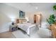 Bright bedroom featuring stylish decor, hardwood floors, and a ceiling fan at 108 Live Oak Dr, Mount Pleasant, SC 29464