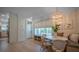 Cozy breakfast nook with a window seat, a round table, and easy access to the kitchen, perfect for casual dining at 108 Live Oak Dr, Mount Pleasant, SC 29464