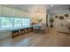 Charming breakfast nook with a built-in bench and window seat, next to a cozy sitting area and ample sunlight at 108 Live Oak Dr, Mount Pleasant, SC 29464
