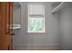 Spacious closet with window offering natural light and custom shelving at 108 Live Oak Dr, Mount Pleasant, SC 29464