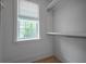 Spacious closet with window offering natural light and custom shelving at 108 Live Oak Dr, Mount Pleasant, SC 29464