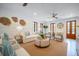 Comfortable living room with ample seating, natural light, and stylish decor, creating a cozy and inviting atmosphere at 108 Live Oak Dr, Mount Pleasant, SC 29464