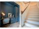 Stylish office space with custom built-ins and natural light near the staircase at 108 Live Oak Dr, Mount Pleasant, SC 29464