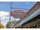 Vintage pharmacy sign on a brick building, evoking a sense of history and local charm at 108 Live Oak Dr, Mount Pleasant, SC 29464
