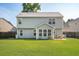 This home features a backyard and a nice covered porch at 108 Plume Poppy Ln, Ladson, SC 29456