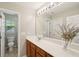 Bright bathroom with a spacious vanity and great mirror at 108 Plume Poppy Ln, Ladson, SC 29456