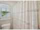 Bathroom view of the shower with a decorative curtain at 108 Plume Poppy Ln, Ladson, SC 29456