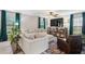 Cozy living room with comfortable seating, and entertainment center at 108 Plume Poppy Ln, Ladson, SC 29456