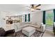 Open-concept living room showcases modern design and seamless flow into the kitchen at 108 Plume Poppy Ln, Ladson, SC 29456