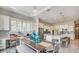 Eat-in kitchen boasts an island with barstool seating, a dining table and chairs, and stainless steel appliances at 113 Magnolia House Dr, Summerville, SC 29486