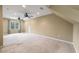 Bright bedroom featuring neutral carpet, a window, and multiple ceiling fans for added comfort at 129 Dunbury Dr, Summerville, SC 29485