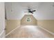 Large, carpeted bedroom with a ceiling fan and neutral walls offers a comfortable and versatile space at 129 Dunbury Dr, Summerville, SC 29485