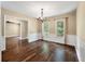 Dining room with hardwood flooring and elegant chandelier for Gathering dining at 129 Dunbury Dr, Summerville, SC 29485