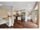 Modern kitchen with stainless steel appliances, granite countertops, and a seamless connection to the dining area at 129 Dunbury Dr, Summerville, SC 29485