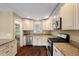 Well-lit kitchen featuring granite countertops, stainless steel appliances, and neutral-toned cabinetry at 129 Dunbury Dr, Summerville, SC 29485