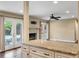 Stylish kitchen island overlooking the living room and providing access to the outdoor pool area at 129 Dunbury Dr, Summerville, SC 29485