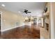 Open-concept living space featuring hardwood floors, a fireplace, and seamless flow into the kitchen area at 129 Dunbury Dr, Summerville, SC 29485