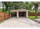 View of open structure pool house on a cement pad, with a storage area and access to the spacious fenced-in backyard at 129 Dunbury Dr, Summerville, SC 29485