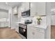 Well-appointed kitchen with stainless steel range and microwave plus tile backsplash at 134 Brown Swiss Cir, Summerville, SC 29483