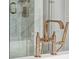 Close up of modern bronze bathroom fixtures and shower with designer faucet at 1479 Jeremy Cay Ct, Awendaw, SC 29429