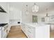 Spacious kitchen with center island, hardwood floors and stainless steel appliances at 1479 Jeremy Cay Ct, Awendaw, SC 29429