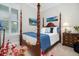 Bedroom with four-poster bed, natural light and nautical décor elements at 1517 Willtown St, Charleston, SC 29492