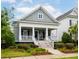 Inviting two-story home with a classic front porch and meticulous landscaping at 1517 Willtown St, Charleston, SC 29492