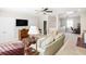 Inviting living room with TV, comfortable seating, ceiling fan, and adjacent office nook at 1517 Willtown St, Charleston, SC 29492