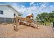 Charming wooden playground with slides and climbing structures, designed for safe and enjoyable play in a Gathering-friendly neighborhood at 1754 Cultivation Ln # 513, Mount Pleasant, SC 29466