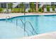 Community pool features accessible handrails and depth markings at 1754 Cultivation Ln # 513, Mount Pleasant, SC 29466