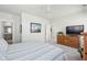 Bedroom showcasing a bed, a TV, and light hardwood floors at 1801 Sandybrook Dr, Mount Pleasant, SC 29466