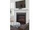 Close up on a fireplace with a shiplap accent wall and mounted television at 1801 Sandybrook Dr, Mount Pleasant, SC 29466