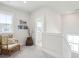 Upstairs hallway sitting area with carpet, neutral paint, and an accent chair at 1801 Sandybrook Dr, Mount Pleasant, SC 29466