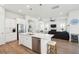 Open-concept kitchen with a large island, seamlessly connected to the living room at 1801 Sandybrook Dr, Mount Pleasant, SC 29466